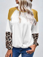 Load image into Gallery viewer, Twisted Color Block Round Neck Long Sleeve T-Shirt